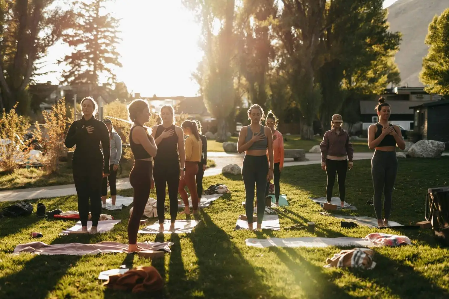 women practicing yoga outside